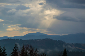 Autumn landscape background in the rain weather with fog