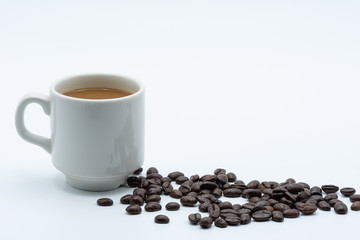 Milk coffee in a ceramic cup on a white background