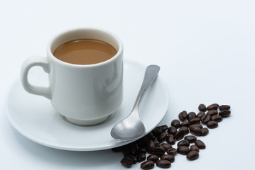 Milk coffee in a ceramic cup on a white background