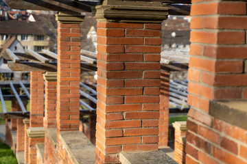 Fototapeta na wymiar brick wall pavilion in the park
