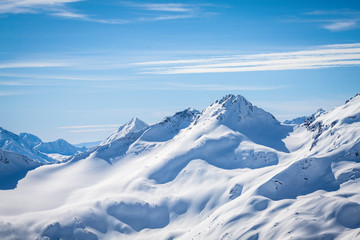 Fototapeta na wymiar Winter panoramic view of the snowy high mountains of Elbrus in the Russia