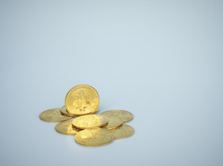 The pile of Bitcoin Crypto currency is placed on the white background.