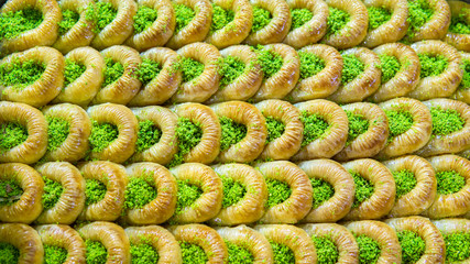 A dough dessert for Turkish cuisine. pistachio dessert sorted in tray
