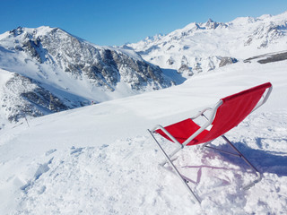 Relax in this chair while enjoying the view from this snowy mountain top in Europe, France,...