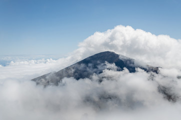 Fototapeta na wymiar Halekala mountain top covered in clouds, Maui, Hawai, USA