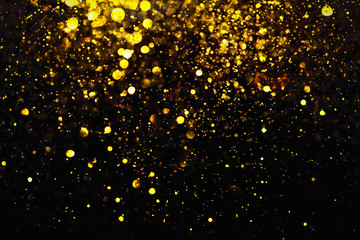 golden glitter bokeh lighting texture Blurred abstract background for birthday, anniversary,...