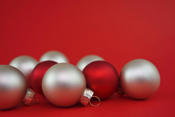 Xmas balls isolated on red background. Christmas balls decoration. Winter concept