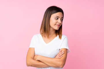 Young woman over isolated pink background portrait
