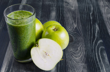 fruit green cocktail in transparent bowl apples and greens healthy food dark background