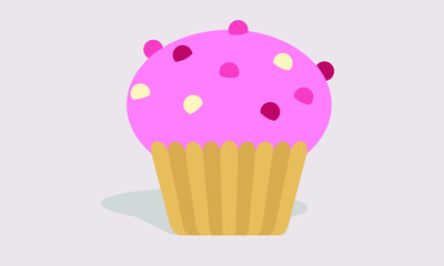 Pink cupcake with icing and sprinkles 