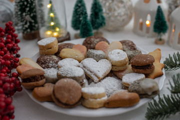 Fototapeta na wymiar home made traditional german christmas cookies on a festive tabel