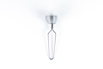 Whisk for whipping on a white background