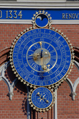City clock at the House of the Blackheads in Riga.