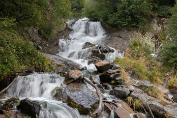 Closeup view waterfall scene in mountains, national park of Dombay, Caucasus