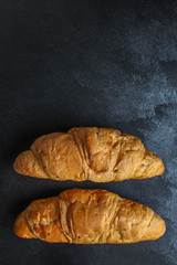 croissant bun (delicious fresh pastries, sandwich roll) menu concept. food background. top view. copy space