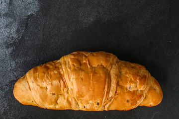 croissant bun (delicious fresh pastries, sandwich roll) menu concept. food background. top view. copy space