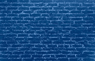 Old blue painted grunge brick wall background