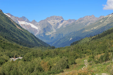 Fototapeta na wymiar Close up view mountains and river scenes in national park Dombai, Caucasus