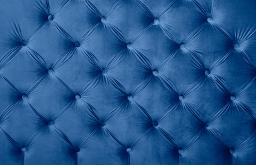 Blue capitone tufted fabric upholstery texture