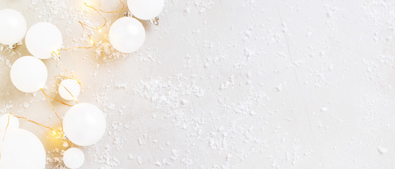 White Christmas or New Year background with festive decoration and Christmas lights