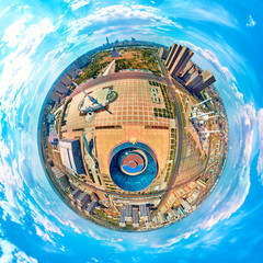 Beautiful panoramic (360 spherical panorama little planet) aerial drone view to Nursultan (Astana) city center with Monument Kazakh Eli, Hazrat Sultan Mosque, Kazakhstan (qazaqstan)