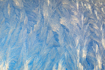 Frosty natural pattern on winter window