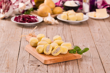 Potato gnocchi stuffed with radicchio and ricotta.