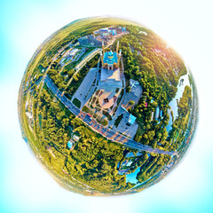 Beautiful futuristic panoramic (360 spherical panorama little planet) aerial drone view to city of Ust-Kamenogorsk (KZ: Oskemen), East Kazakhstan (Qazaqstan)