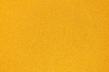 Gold color of glitter textured background