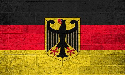 Flag of Germany on old brick wall background