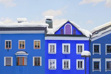 Bright multicolored facades of old medieval buildings in historical center of famous alpine austrian town Kufstein in Austria Europe. Colorful houses in small european city center with blue clear