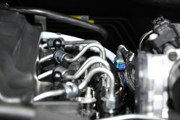 Fototapeta premium powerful engine of a car. Internal design of engine. Car engine part. Modern powerful car engine.
