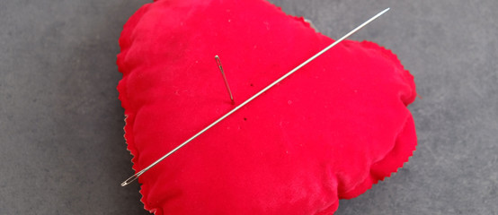 needle and heart shaped pincushion, needle and pincushion,