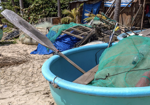 Vietnamese fishing coracles on beach, tribal boats