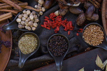 Thai ingredient in plate on black cloth and table.
