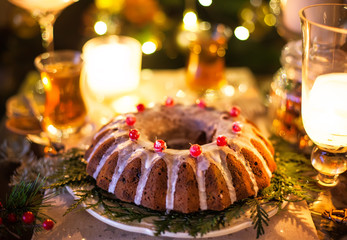 Traditional Christmas cake with dried fruits, raisins and nuts with Christmas decoration