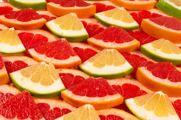 Pomelo and grapefruit slices background.