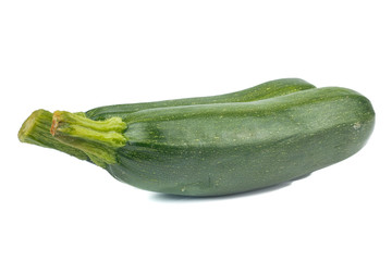 Fresh green Zucchini (Cucurbita pepo var. cylindrica) isolated on white background