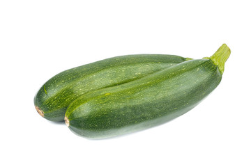 Fresh green Zucchini (Cucurbita pepo var. cylindrica) isolated on white background
