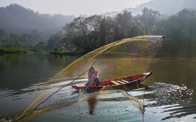 throw fish nets on the lake