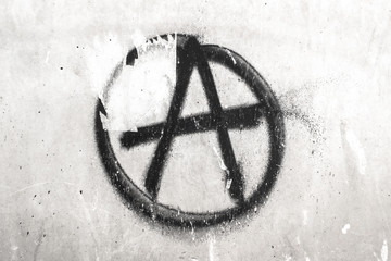 Symbol of Anarchy painted on a wall - obrazy, fototapety, plakaty