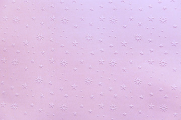 New Year and Christmas background in light lilac in the stars. Ornamental paper texture.