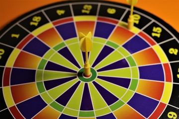 Board dartboard with two Darts at the target