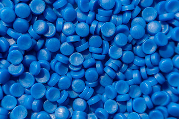 Close-up of plastic polymer granules. hand hold Polymer pellets. polymer plastic. compound polymer.
