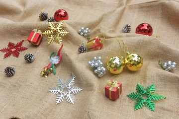 Christmas balls stacked on fabric, happy new year, merry christmas