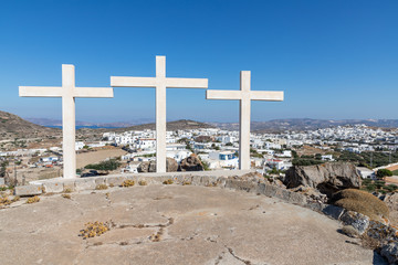 Crosses over a mountain with Plaka village in background