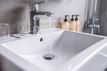 Modern bathroom faucet, Very high end faucet, sink, and counter in a luxury bathroom