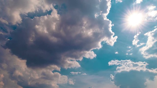 blue sky with clouds and sun timelapse