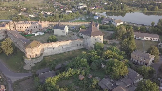 Aerial to Medzhybizh Castle and Church of St. Nicholas, one of the strongest fortres of the Crown of the Kingdom of Poland in Podolia. It is situated at confluence of Southern Bug rivers, Ukraine