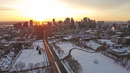 Fototapeta premium Montreal Canada winter sunrise behind downtown skyscrapers
